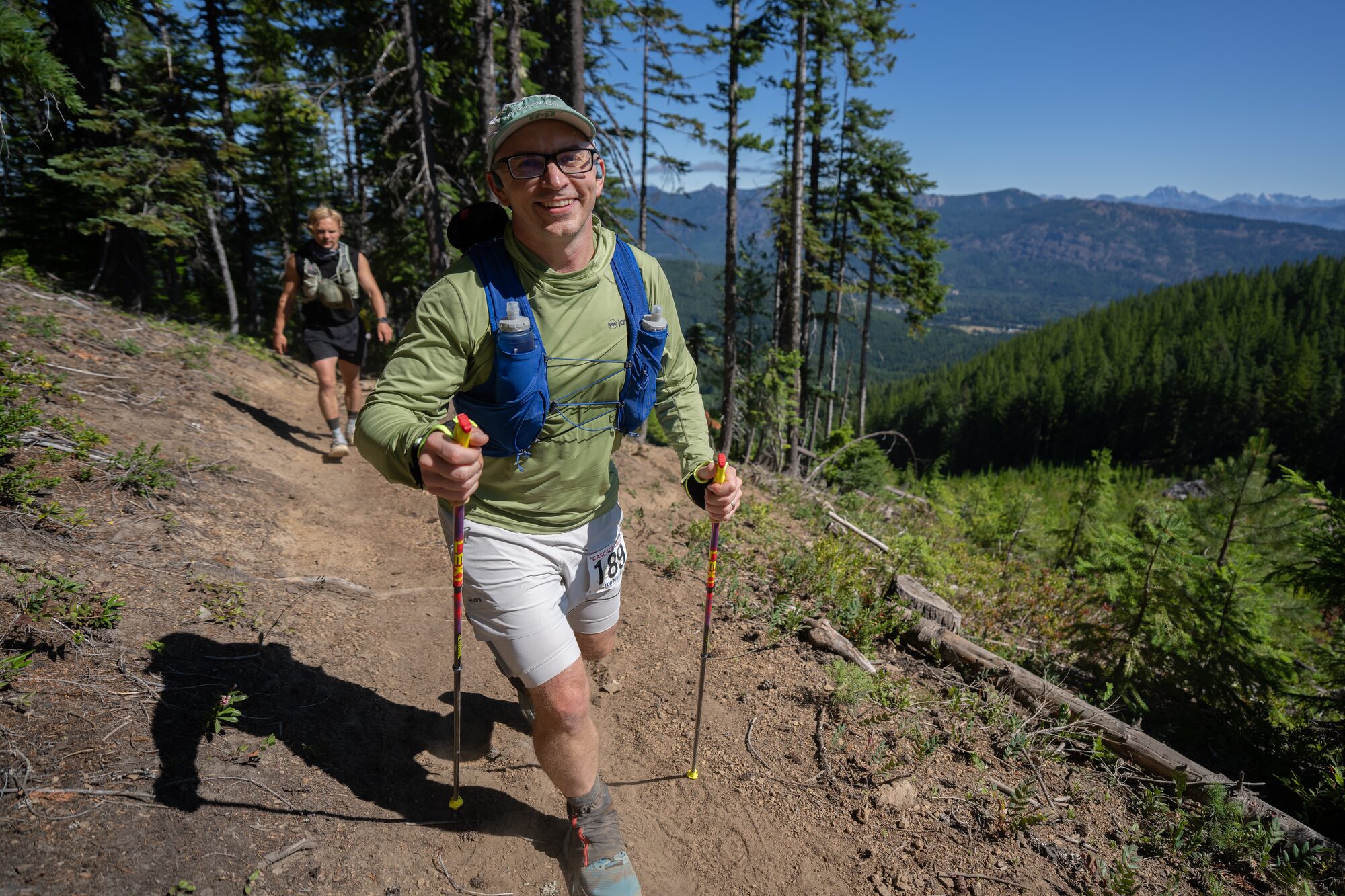Wade hiking an exposed climb during Cascade Crest